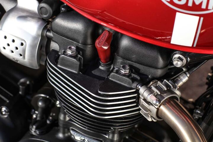 2016 triumph street twin first ride review, A single 39mm throttle body behind the brushed alloy trim keeps intake velocity up for excellent torque The other Bonnies will use twin throttle bods It would be truly classic if we could dispense with big ugly gas tank seams Alas