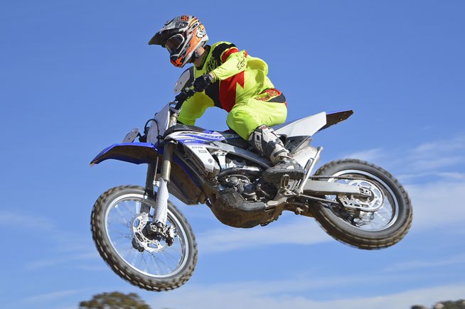 2016 yamaha yz450fx ride review, Suspension at both ends is plush with KYB s 48mm Speed Sensitive System SSS fork up front and a fully adjustable piggyback reservoir fork out back We love the fork but aggressive or heavy riders might opt to revalve the shock for better bottoming resistance