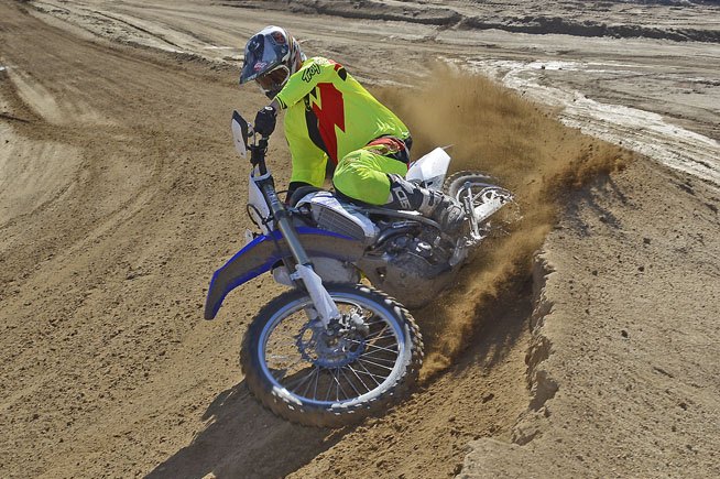 2016 yamaha yz450fx ride review, Despite its engine and transmission changes we were impressed with just how competent the FX was on the motocross track portions of our Cahuilla Creek test loop especially after we reprogrammed the ECU The FX can shred berms with the best 450cc motocrossers in the class