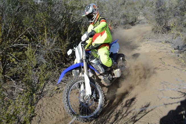 2016 yamaha yz450fx ride review, Some of the YZ s handling traits stunt the FX in the handling department Its steering is light but not as precise as we d like at slow speeds and the front end is slightly nervous at high speeds