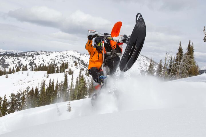 timbersled snowbike conversion, Dashing through the snow MO style We bet you ve never ridden a wheelie through snow this deep on your standard two wheeler It s no problem on a snowbike