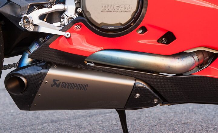 ducati panigale superleggera quick ride review video, The Superleggera s price includes this Akra exhaust race ECU a taller windscreen bike cover and paddock stands Standard equipment includes lovely foot controls that could be worn as jewelry