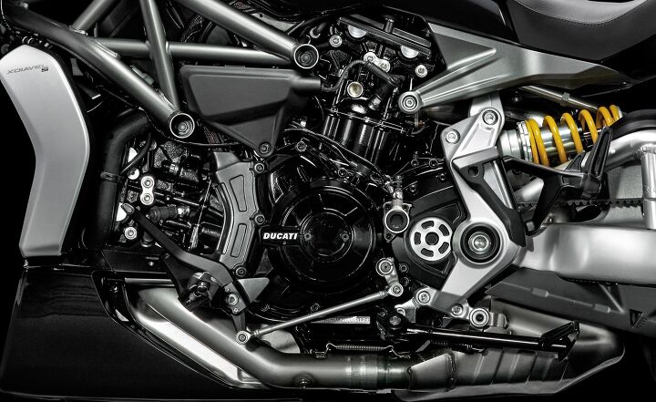 2016 ducati xdiavel s first ride review, With the water pump moved from the alternator cover to the space between the cylinders the cooling hoses are practically invisible tucked up against the radiator instead of covering the side of the engine