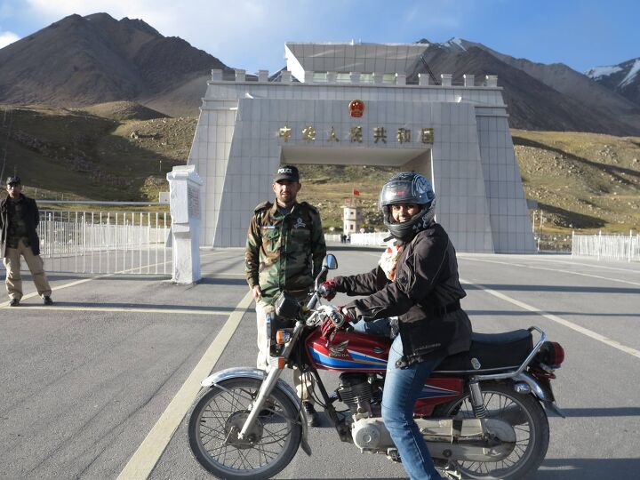 pakistani woman breaking boundaries through motorcycling video, Irfan at the border to China along the Khunjerab Pass