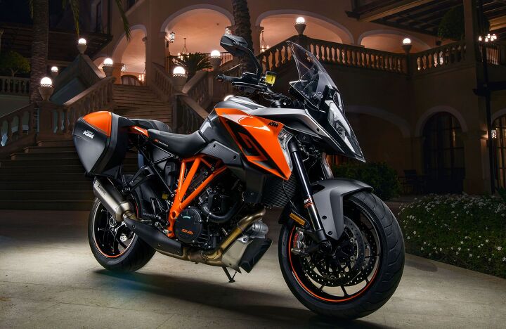 2017 ktm 1290 super duke gt first ride review, This Orange colorway is available in addition to the Anthracite version of the bike I rode at the launch The titanium slip on muffler is an option from KTM s Power Parts catalog