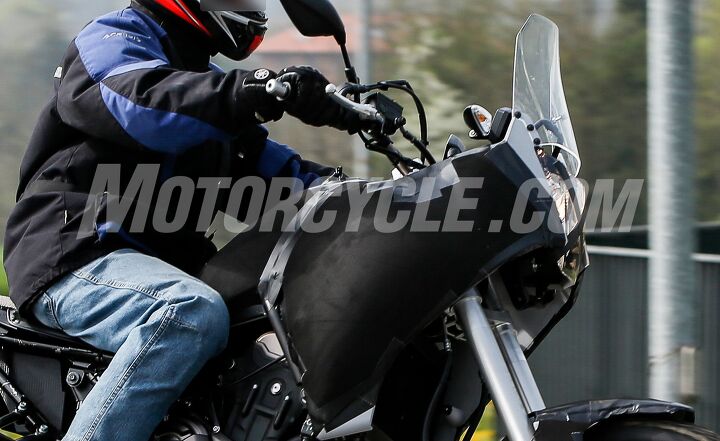 mo espionage yamaha fz 07 tenere spy shots, There s a fairing under that rubber matt and the windshield appears to be non adjustable Behind the fairing is a gauge cluster that looks like the FZ 07 s