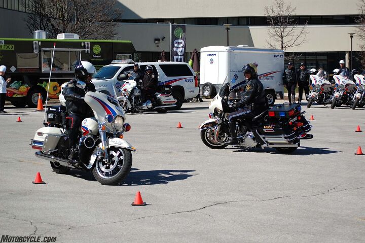 motorcycle safety awareness, Officers demonstrated slow speed maneuvers riding their big heavy police Harleys in tight circles Not once did a boot touch the ground though the same can t be said of an occasional exhaust pipe