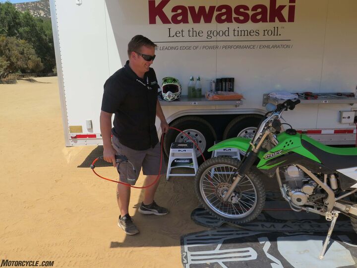 2017 kawasaki klx140g review, Kawasaki s Aaron Lach can blow clean a dirtbike in under 40 seconds flat
