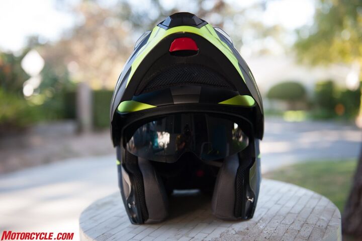 mo tested scorpion exo at 950 helmet review, When it comes to fit the thickness of the cheekpads marks the difference between a medium and a large The pads seen here are for a medium helmet Large heads would get thinner pads Note also the red lever at the chin to flip the chin bar open