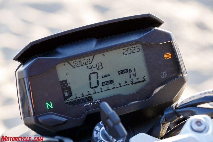 2017 bmw g310r first ride review, A clean clear and crisp LCD instrument cluster is fitted to the G310R and is even easy to see in direct sunlight It provides all the necessary information including a big gear position indicator fuel gauge and speedometer The tach is a bit hard to read at a glance but the engine is usually spinning so high anyway you can just shift by ear