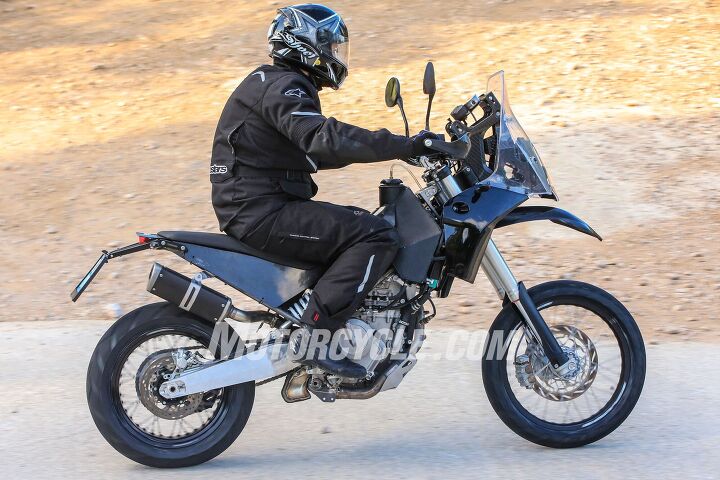 spied ktm 390 adventure prototype, Wonky looking and clearly far from production ready the test mule seen here is obviously in information gathering guise We re seeing different engine cases than what s currently housing the 390 Duke mill so maybe there s an engine surprise in the works or perhaps a smoother shifting transmission