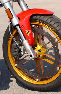 church of mo 2004 xb12s cheddarheads strike again, This wheel tire assembly complete with Buell s Zero Torsional Load brake is really really light Simplify