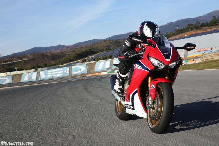 2017 honda cbr1000rr and cbr1000rr sp review, Ergonomically the new CBR is noticeably slimmer than before especially between the knees There s plenty of room front to back as well For my 5 foot 8 inch stature the bars felt a little too far forward for my taste but the taller riders on the launch seemed to like it Another minor quibble the windscreen forms a V shape at its apex and in a tuck I noticed an unusual amount of wind buffeting atop my helmet Were it mine a broader or double bubble screen would be one of my first modifications