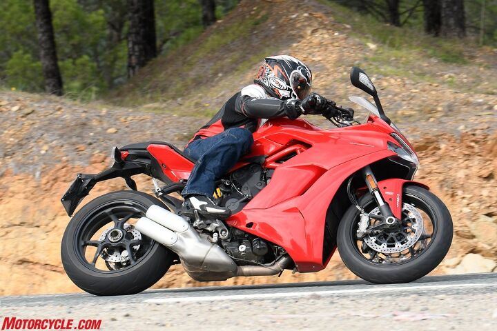 2017 ducati supersport review, Visual lightness comes from cutting out the lower part of fairing to keep front header pipe visible while the short exhaust silencer exposes the rear wheel