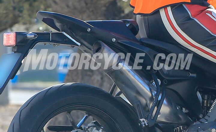 2018 ktm 790 duke spy shots, From the cobby muffler welds to the homemade looking brake light support the back of the 790 doesn t look as finished as the rest of the bike With power delivery as raucous as we expect the 790 s to be we wonder if the adjustable seat bolster a k a butt slide stop will make it to the production version