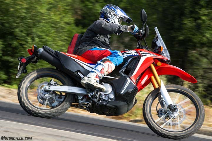 2017 honda crf250l rally review first ride, Although the CRF250L Rally weighs more than the Honda CRF250L the extra poundage doesn t hurt it in the handling department The Rally is a capable corner carver on asphalt