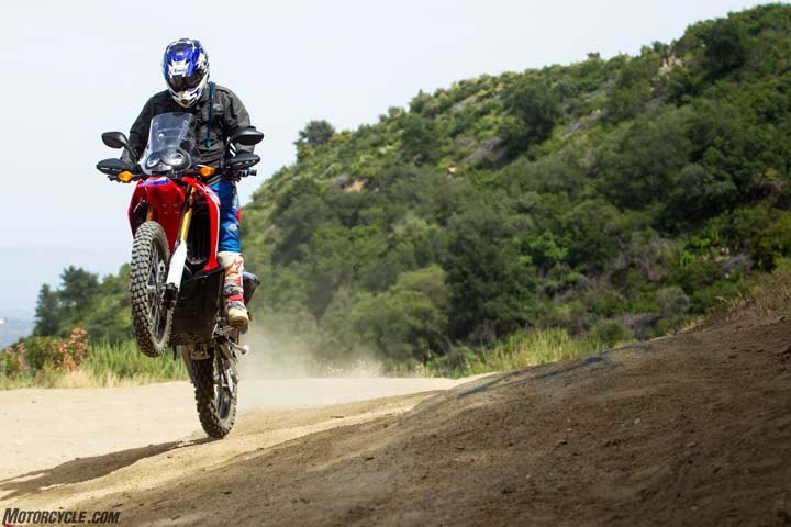 2017 honda crf250l rally review first ride, Although the CRF250L Rally boasts about 1 2 inches more travel than the CRF250L its extra weight and soft suspension settings require that you pick your flights carefully The CRF250L delivers a tauter ride that is more conducive to off road tomfoolery