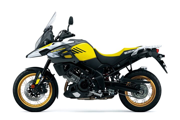 first look 2018 suzuki v strom 1000 and 1000xt, Available in this lovely yellow or shiny black the XT gets strong suitable for offroading tubeless style wire spoke wheels in the appropriate 19 and 17 inch sizes along with hand guards and a fat aluminum handlebar