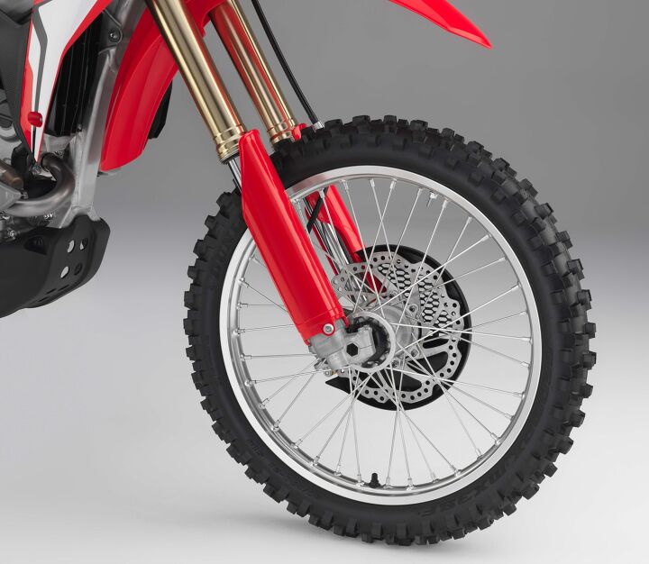 2018 honda crf250r first look, The CRF250R now features a 49mm Showa coil spring fork instead of an air fork The internals are a production version of Showa s A Kit race suspension