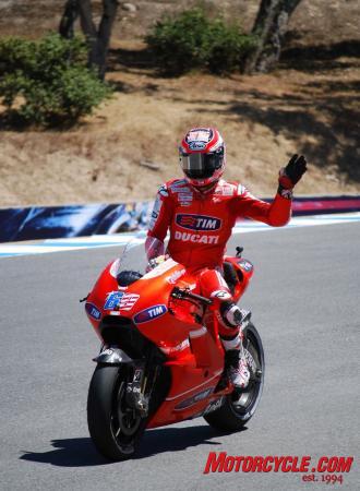 church of mo this too shall pass, Nicky Hayden waves to the crowd in the Corkscrew at the end of the race Despite no podium placing for Hayden his sixth place finish in the 2010 Laguna Seca MotoGP was respectable American fans seemed to approve of his efforts