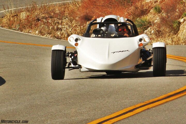 campagna t rex 16sp review, The ultra distinctive T Rex delivers major league excitement when aimed at a twisty set of corners at least for a vehicle that leans the wrong way into them not that it leans hardly at all It s inches shorter than a Mini but inches wider than a Corvette With its 1 65 liter engine placed behind the seats Campagna says the Rex has 57 of its weight distributed to its front end when saddled with two people which is surely more effectively distributed than the front engined 2 4 liter Slingshot