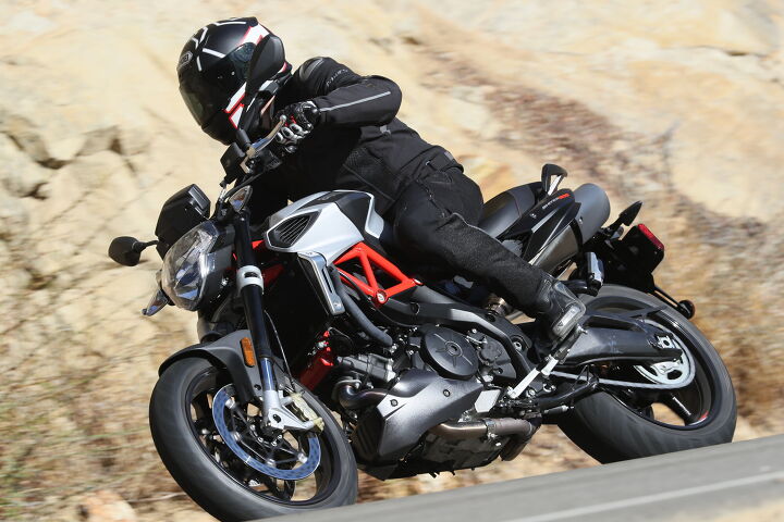 2018 aprilia shiver 900 first ride review, I often find myself gravitating toward motorcycles on which I can barely touch one foot down flat which often yields desirable legroom though the 32 inch seat height of the Shiver 900 was a welcome comfort