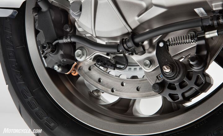 first look 2018 honda gold wing and gold wing tour, The single piston caliper right is the parking brake for the DCT models and is actuated by a lever on the lower left side of the fairing