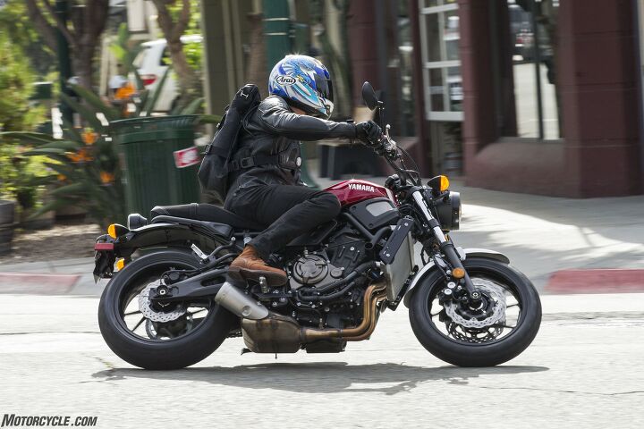 2018 yamaha xsr700 sport heritage first ride review, Throwing the XSR into city corners is no problem even with all the potholes cracks and railroad tracks The 41mm fork and rear monocross shock handle the bumps with ease