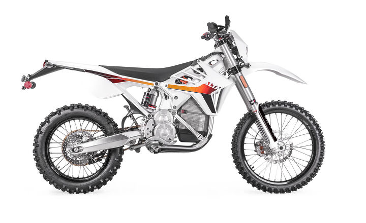 the rise of electric vs gas powered motorcycles, The Alta Motors Redshift in Enduro EX trim weighs a claimed 275 lbs has a 58 6 inch wheelbase 38 2 inch tall seat 26 2 degree rake 21 and 18 inch wheels two piston Brembos paired with a 260mm rotor in front and a single pot Brembo 219mm disc out back Also street legal
