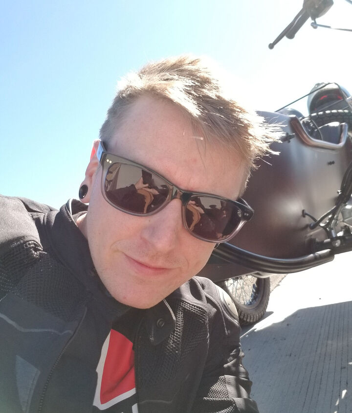 a ural gear up and the road ahead, When you re a millennial Ed as pale as I am you hide under the sidecar to get out of the sun and then take selfies to document your plight