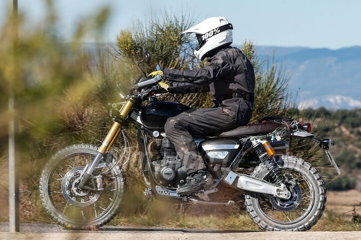 2019 triumph scrambler 1200 spied, We only have shots of the front and left side of the bike but you can see short curve of the exhaust manifolds and the high mounted silencers on the right resembling the exhaust system on the smaller Street Scrambler