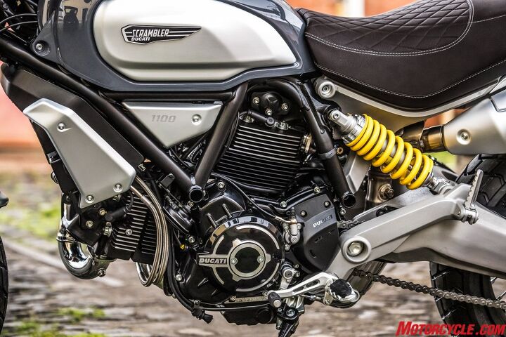 2018 ducati scrambler 1100 first ride review, The 1 079cc Desmodue engine from the Monster 1100 is likely a familiar sight for many Ducatisti and its excellent street manners have been further refined for Scrambler 1100 duty A reconfigured head and switch to single throttle body give the engine a broad range of torque accessible early in the rev range