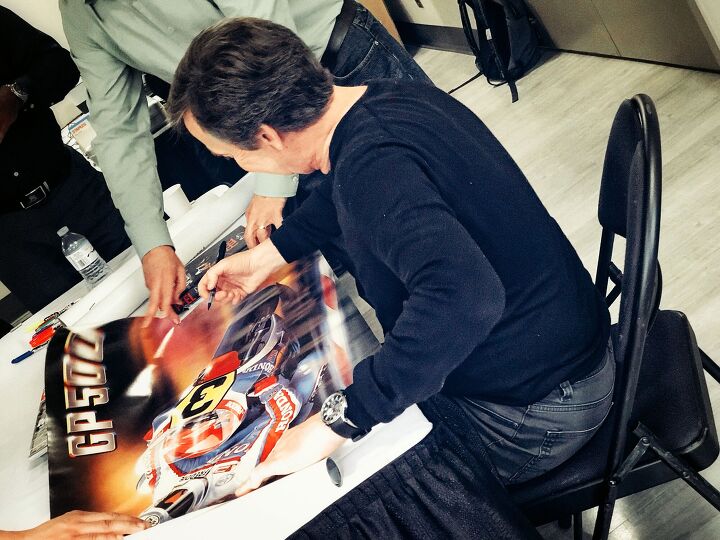 feel a dinner with freddie spencer, Freddie signs a poster for a fan Photo by Armondo Lulu