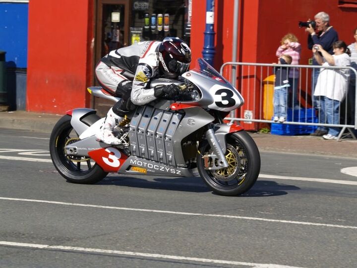 is electric bike racing the next big thing, American Mark Miller aboard the American MotoCzysz E1pc would go on to win the 2010 TT Zero race A special moment no doubt but it paled in comparison to the MotoCzysz vs Mugen battles that started two years later
