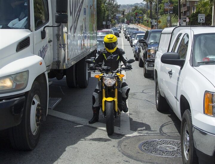 toronto to consider allowing lane sharing, Lane filtering allows motorcycles to move between lanes to get to the line when traffic is stopped at a controlled intersection It s not quite lane splitting but it s a start