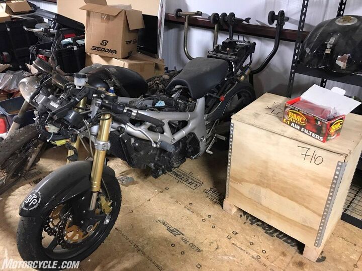 shipping a motorcycle across the country is easier than you think, There s my trusty SV650 now in its Pensacola home of 11 years Probably the first time it s seen light in some time