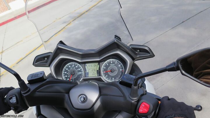 2018 yamaha xmax review, Dunno that a scooter needs a tachometer really but why not Usually the needle hangs around 5000 rpm but goes to 7200 when you come over all WFO LCD panel includes a clock coolant temp and gas gauges In addition to the tripmeter there s also an oil change tripmeter that tells you when it s time 600 miles then every 3000 a V belt replacement trip every 12 000 miles and an info display that scrolls through air temp voltage TC status average and instant fuel consumption and average speed