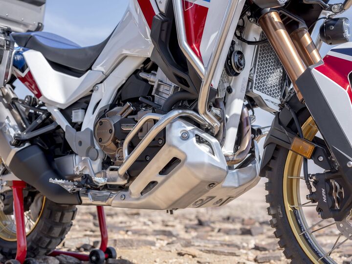 2020 honda africa twin and africa twin adventure sports es first look, The Adventure Sports ES comes with a thicker skid plate Those crash bars are sold separately however whereas they were stock on the previous Adventure Sports
