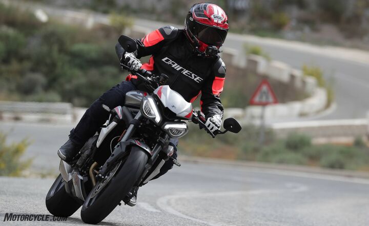 2020 triumph street triple 765 rs review first ride, There s no arguing that the new headlights look angrier We predict that there will be plenty of fans and critics The rest of the changed bodywork on the radiator and tail section will be less controversial