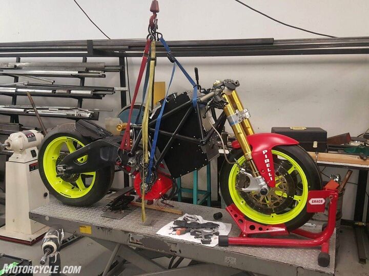 riding and racing the lightfighter lfr19 electric motorcycle part 1, The day after Christmas 2018 the battery takes its place in the frame The erector set is quickly coming together