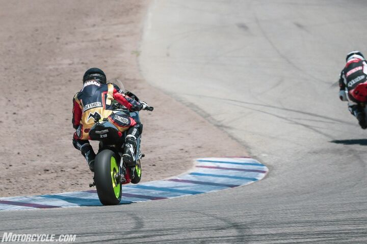 riding and racing the lightfighter lfr19 electric motorcycle part 2, Giving er all she s got in pursuit of Ducatis and Pierobons results in hoisting the front end from time to time