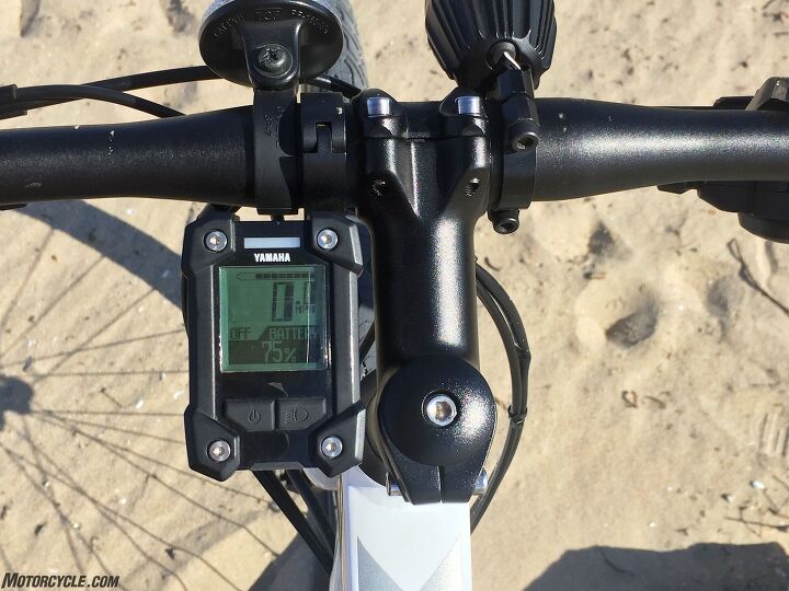 yamaha cross core ebike review, There s a speedo in here odometer tripmeter battery life meter etc there s also a USB port and the headlight is standard equipment also