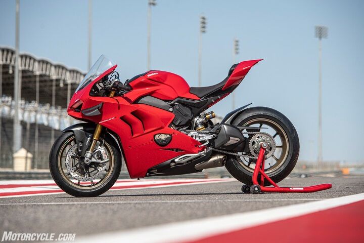 2020 ducati panigale v4 s video review, The 2020 Ducati Panigale V4 S seen here represents the pinnacle of Ducati production superbike technology and engineering Powered by a 1103cc V4 its supporting cast includes hlins electronic suspension and Brembo Stylema calipers One of the most advanced electronic rider aids suite helps the rider lap faster longer and the winglets at the front are derived from MotoGP to provide up to 37 kg of downforce at 300 kph