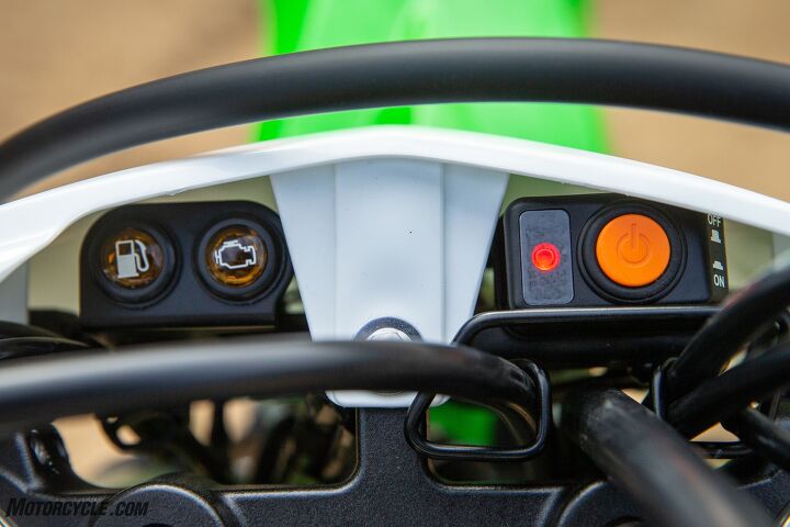 2020 kawasaki klx300r review, The mostly spartan dash area includes the power button with power indicator light a low fuel light and an FI warning indicator