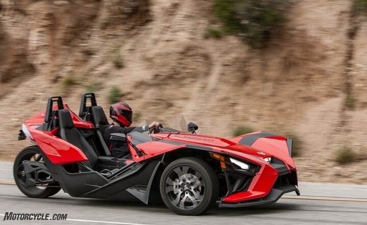 2020 polaris slingshot sl review, While the word practical doesn t come to mind when considering the Slingshot it does have enough storage behind each seat for even the largest of helmets as well as a sizable glovebox all of which can be locked