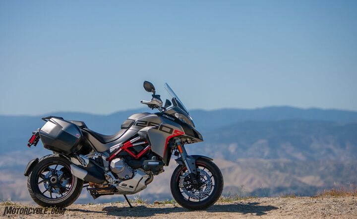 2020 ducati multistrada 1260 s grand tour review, The 17 inch cast wheels point to the Grand Tour s street focus but the Pirelli Scorpion Trail IIs will get you down a dirt road or two without drama