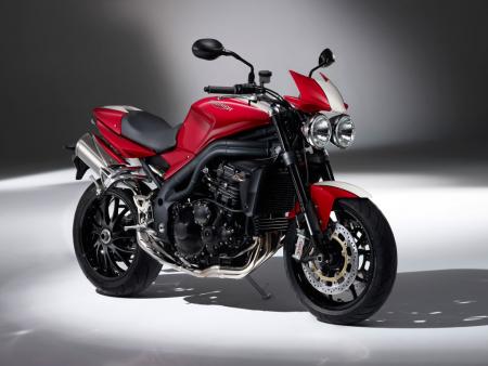 church of mo 2010 streetfighter shootout kawasaki z1000 vs triumph speed triple, Just announced for 2010 is this Special Edition Speed Triple equipped with a flyscreen seat cowl and Tornado Red paint with a white center stripe