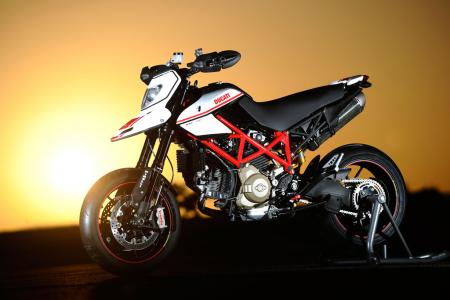 church of mo 2010 ducati hypermotard 1100 evo evo sp review, The EVO SP features improved brakes Ohlins mono shock and a longer Marzocchi fork