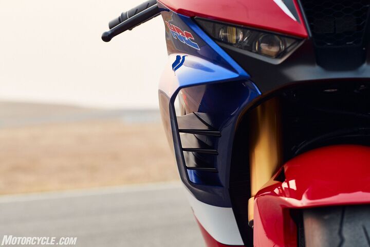 2021 honda cbr1000rr r fireblade sp review first ride, I gotta admit the trend towards sticking winglets out in the open on today s literbikes seems like an afterthought to me Concealing the strakes within an enclosure like on the CBR is much more appealing to my eyes Plus Honda says this triple stacked vertical outlay of winglets produces just as much downforce as the 2018 RC213V