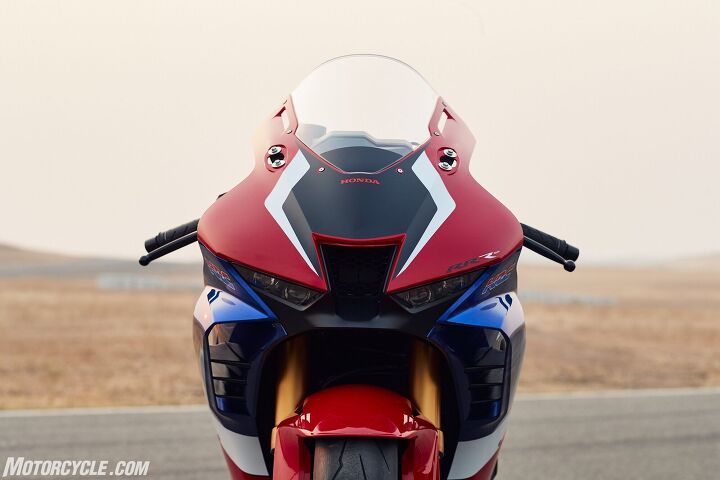 2021 honda cbr1000rr r fireblade sp review first ride, The ram air opening is the same volume as the RC213V MotoGP bike If you look closely you ll see an inner lip along each edge of the opening This acts as a kind of turbulator to the incoming air which has a very direct path to the airbox thanks to the removal of the traditional ignition barrel where one would normally insert their key Also winglets